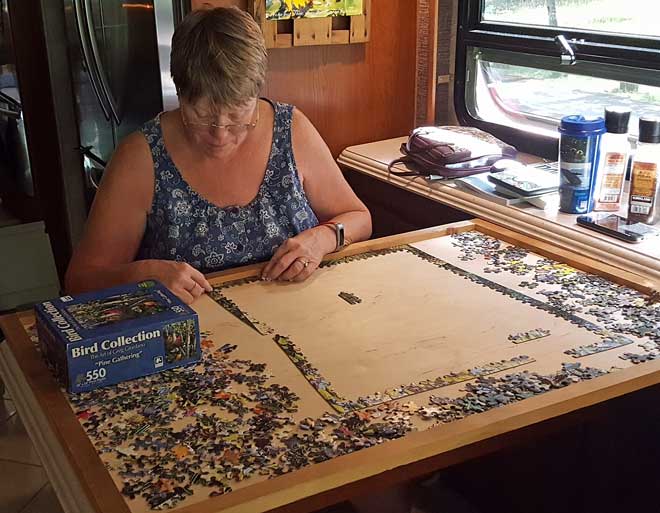Gwen does a puzzle while I ride