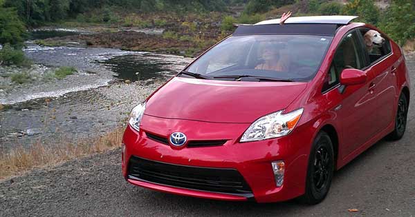 Our new 2013 Prius next to the North Umpqua, Behind: Morgan approves of the purchase