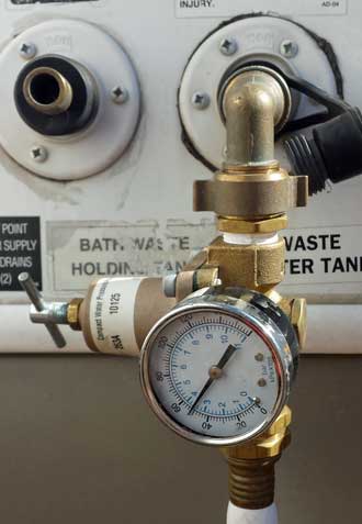 Water pressure regulator installed, Behind: water source.