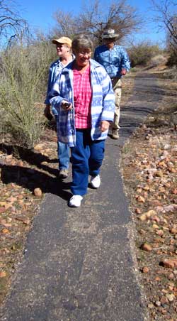 Janet leads the way to her first Geocache