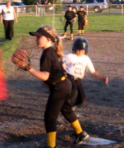 Courtney Scores at home plate