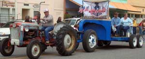 Tractors are part of the parade in the rural town