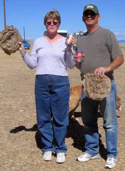 Gwen and Dale get their reward for winning the cow pie contest