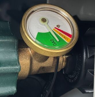 Added gauges to the propane tanks and installed a TV in the bedroom
