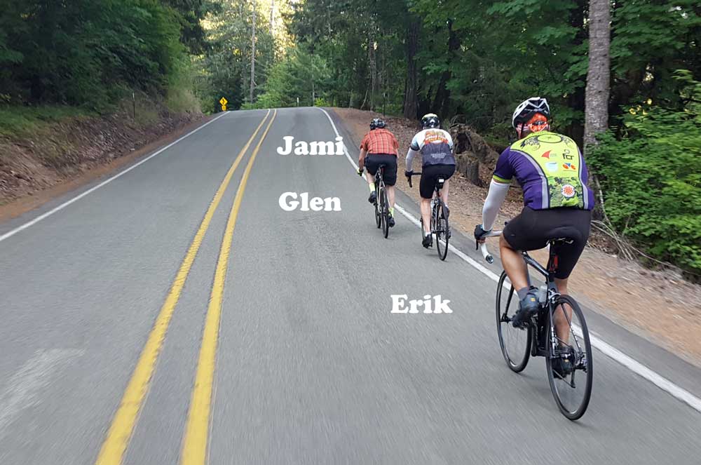 Jami, Glen and Erik riding on Tyee Road next to the Umpqua River