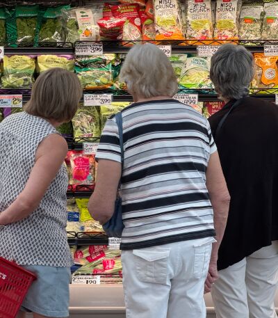 Shopping bagged greens at Trader Joes
