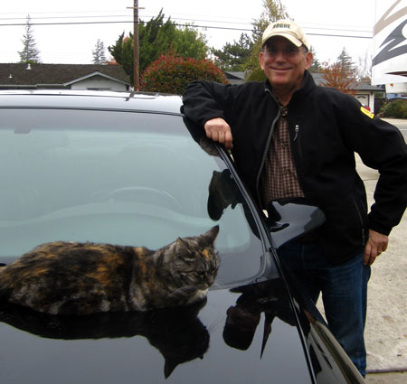 Posing with the cat and Dorana's car