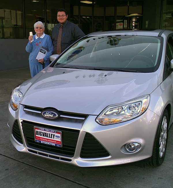 Joseph and Mom with Mom's new Ford Focus