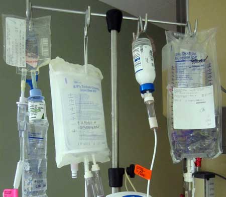 These are bags of medications and fluids passing into his blood