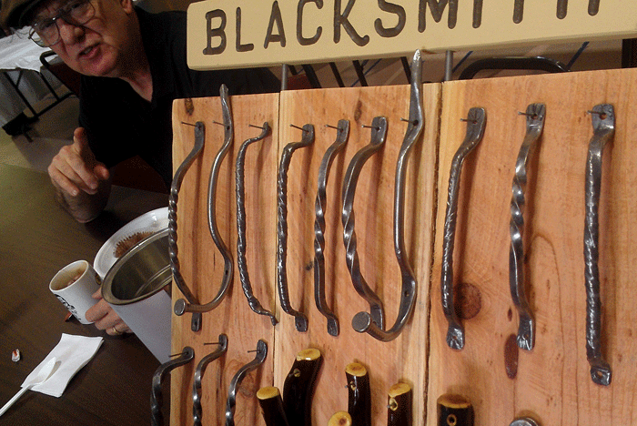 JD displays his blacksmith work