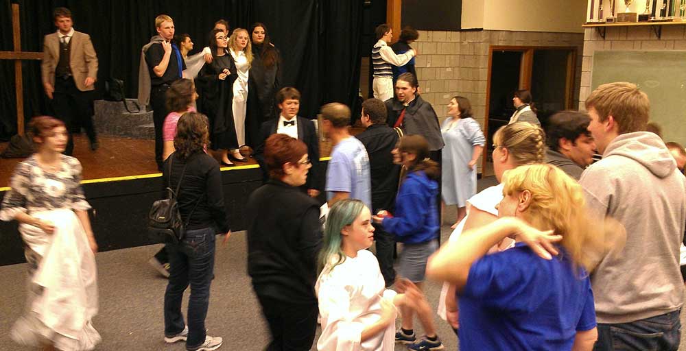 Sutherlin High School actors congratulate each other at the end of Dracula