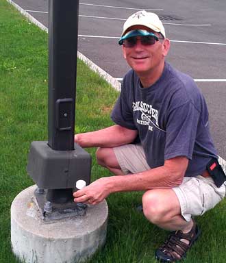Dale finds a cache under the pedastal of a light post