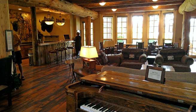 Interior of the Suttle Lake Lodge, behind: bar with hand carved mirror frame