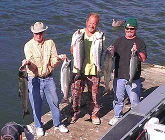 Some very happy Salmon fishermen, Behind: a wider view