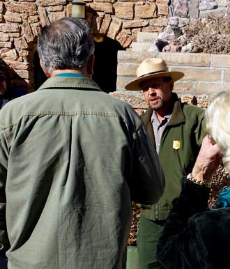 Allen, our ranger guide tells us of the Furnace Creek Inn history, Behind: The deck out back of the Inn