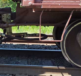 The train rolls over the penny