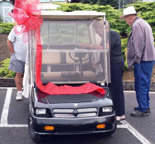 The new (used) golf cart for the Welcome committee