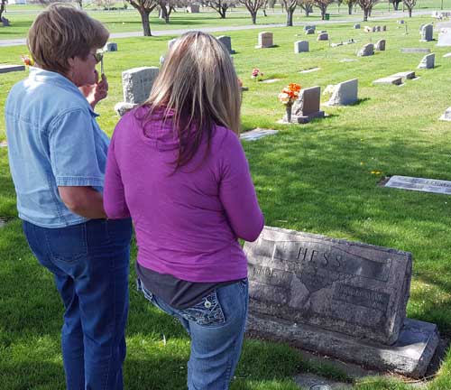 Gwen and Lesa at grandparents grave