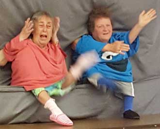 Sue and Anita play a dwarf skit