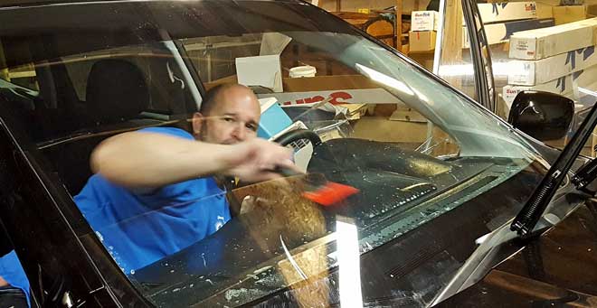 Dave is installing windshield tinting