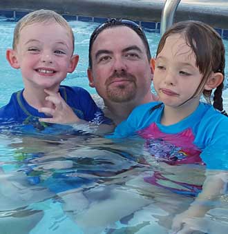 Noah, Ben and Chloe in the pool