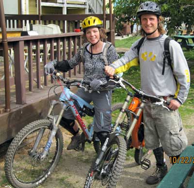 Mindy and Scott on downhill mountain bikes