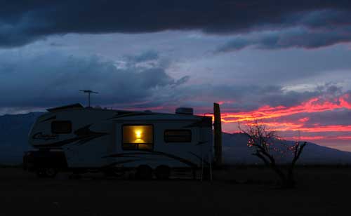 Ralph and Janet's Fifth wheel against the red sunset