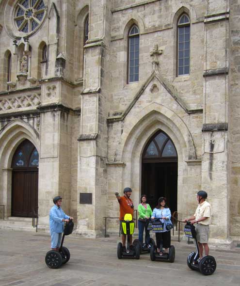In front of the cathedral, behind, in front of the courthouse