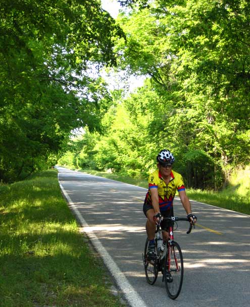 Cycling in rural Mississippi with Emerald Mound behind