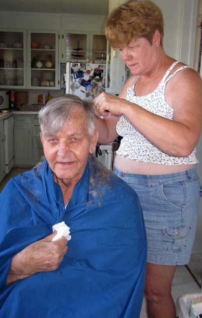 Gwen gives my Dad a professional haircut