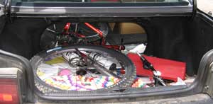 The new bike fit into the trunk of my Toyata Camry with the rear seat down.