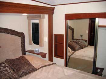 Queen bed, window and closet