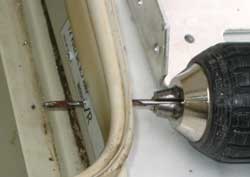For the high speed fan cover, two sheet metal screw holes are drilled